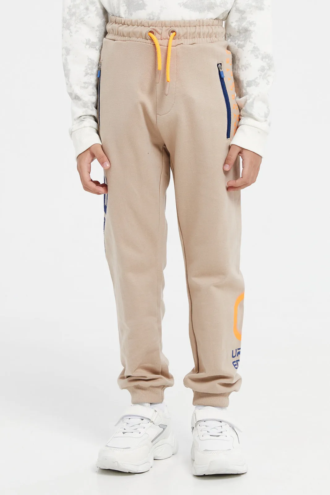 Boys Beige Zip Pocket With Print Jog Pants